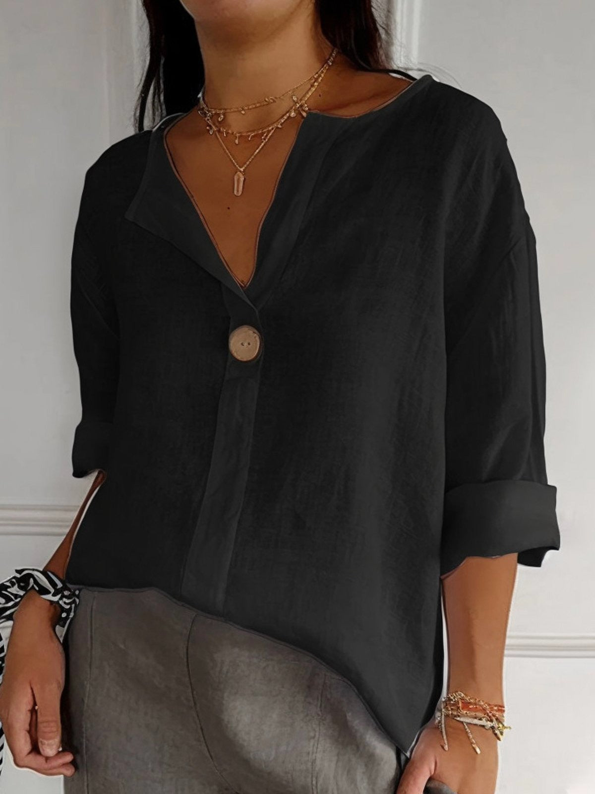 Almudena | Blusa de algodón con escote en pico y botón